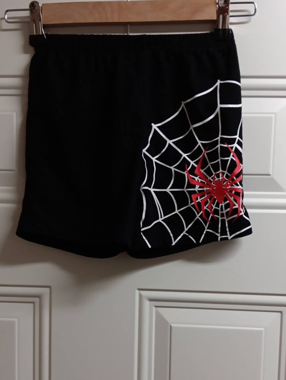 SHEIN Black Kids Shorts with White Web and Red Spider Graphic